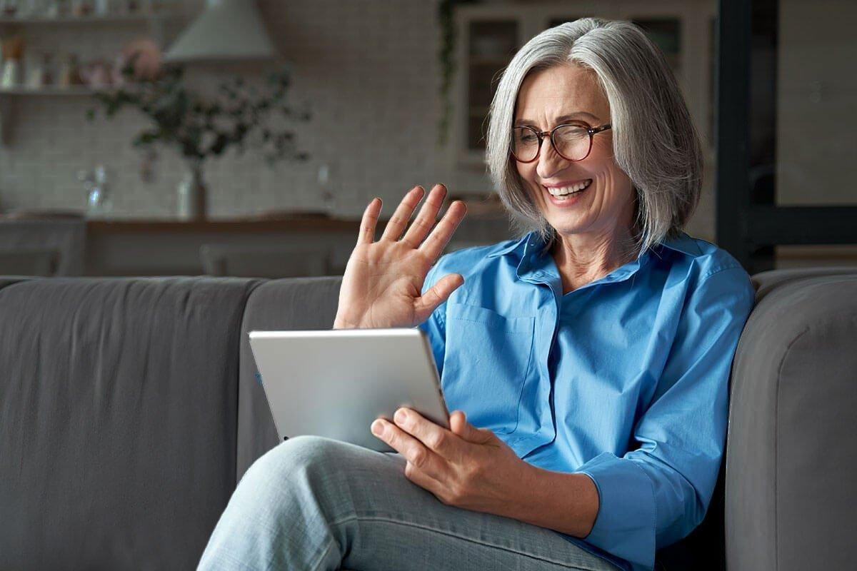 Mother-on-sofa-with-tablet-DARKER