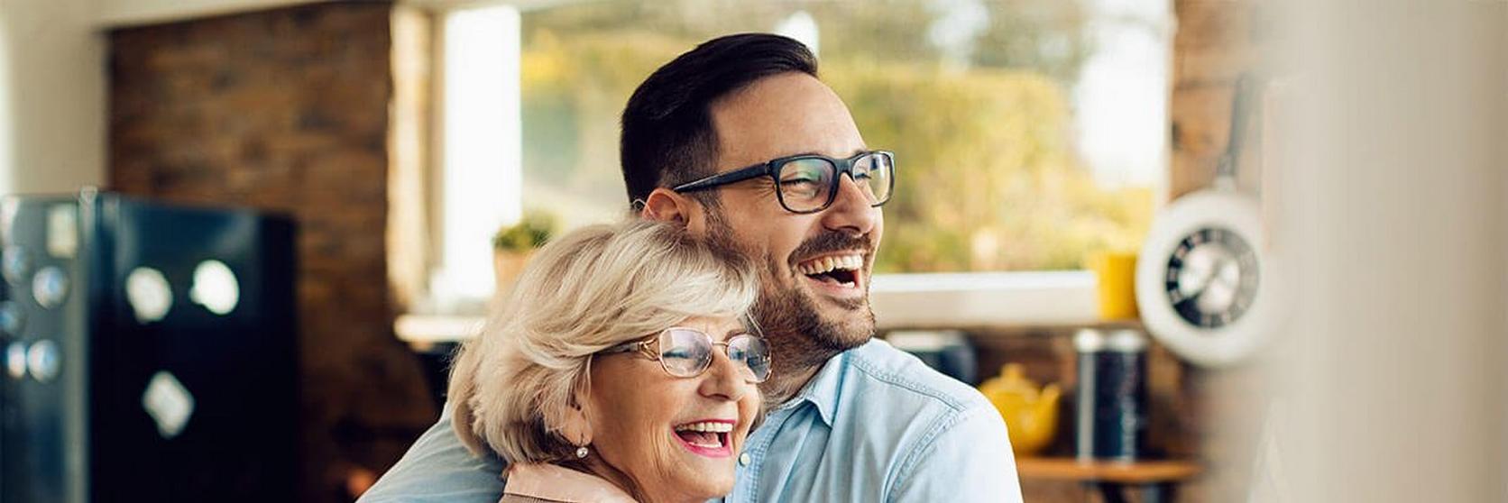Mother-son-hugging-laughing