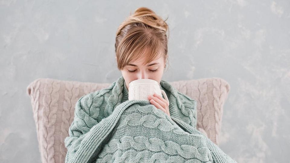 drinking-tea-in-bed-unwell