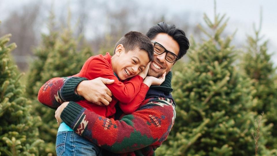 father-and-son-hugging-smiling